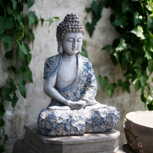 Harmony in Blue: The Tranquil Presence of a Blue Buddha Statue in Dhyana Mudra